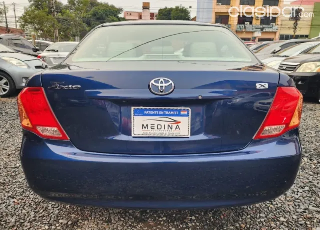 Toyota Axio 2008 — foto 7