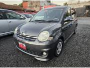 IMPECABLE TOYOTA SIENTA REC. IMPORT. COLOR GRIS HUMO 2006/07 MOTOR VVTI 1.5 AUTOMATICO