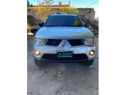 Mitsubishi Triton año 2009 del representante