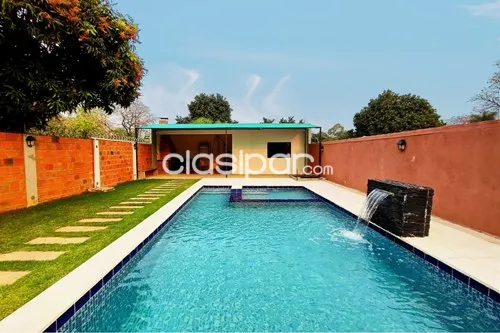 VENDO CASA CON PISCINA EN LUQUE- CAÑADA SAN RAFAEL — foto 2