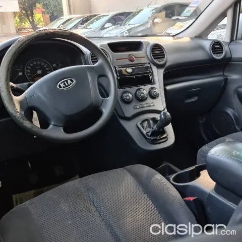 Kia Carens 2011 — foto 4