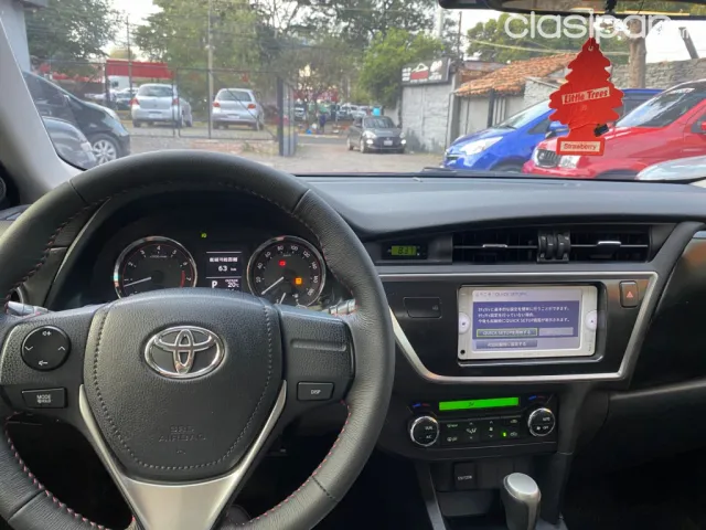 Toyota Auris 2013 — foto 7