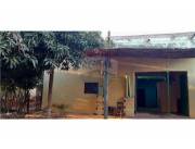 Amplia propiedad de 12 habitaciones con baños ideal para alquilar en Isla Bogado, Luque