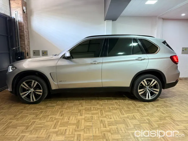 Bmw X5 2014 — foto 7