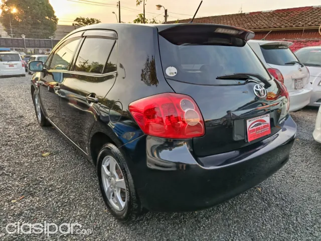 Toyota Auris 2009 — foto 6