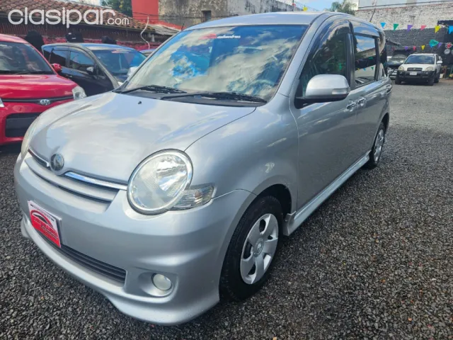 Toyota Sienta 2009 — foto 3