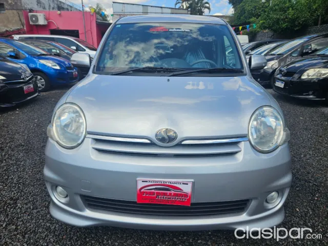 Toyota Sienta 2009 — foto 4