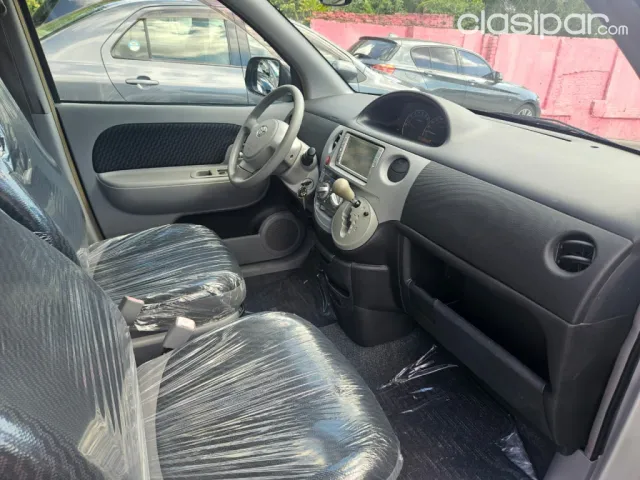 Toyota Sienta 2009 — foto 7