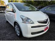 HERMOSO TOYOTA RACTIS FUL EQUIPO REC. IMPORT. BLANCO 2008/9 MOTOR VVTI 1.5. AUTOMATICO