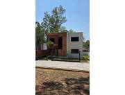 VENDO CASA A ESTRENAR DE 3 DORMITORIOS EN BARRIO CERRADO PARAISO. MARAMBURÉ - LUQUE