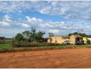 Terreno con casa