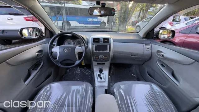 Toyota Axio 2010 — foto 3