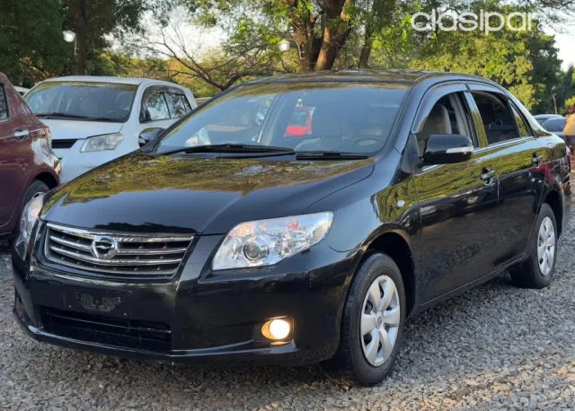 Toyota Axio 2010 — foto 6