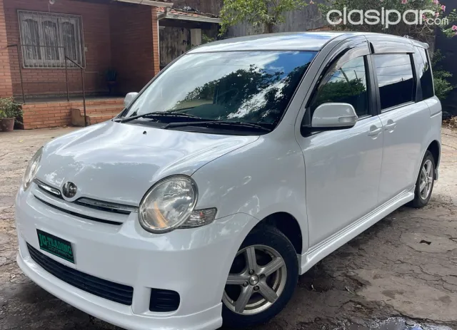 Toyota Sienta 2009 — foto 4