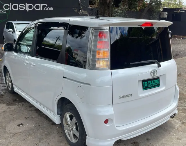 Toyota Sienta 2009 — foto 5