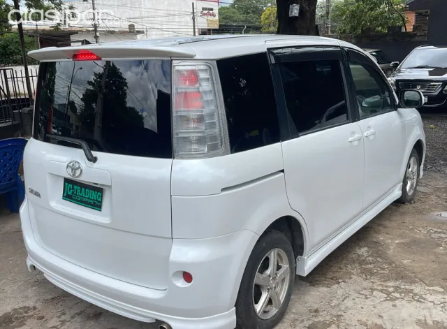 Toyota Sienta 2009 — foto 7