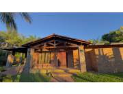 VENDO AMPLIO TERRENO CON CASA DE 3 DORMITORIOS Y PISCINA EN AREGUÁ - PATIÑO