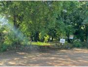 VENDO 2500M2 EN CAACUPE, SOBRE ASFALTO, CERCA DEL CENTRO