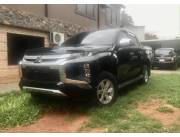 IMPECABLE MITSUBISHI TRITON L200 2.023 - NEGRO
