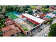 VENDO TERRENO CON CANCHAS EN LAMBARE SOBRE ASFALTO