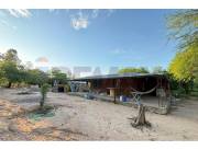 Casa con amplio terreno en Cruce Boquerón, Loma Plata.