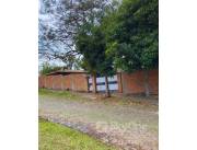 VENDO TERRENO AMURALLADO EN LAMBARE