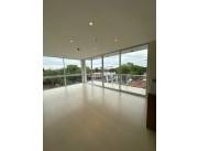 Oferto departamento de 2 dormitorios con 1 cochera Barrio Manora