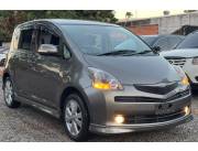 VENDO IMPONENTE TOYOTA RACTIS FARO LUPA CON EQUIPAMIENTO TRD AÑO 2009 RECIEN IMPORTADO,