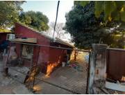 PROPIEDAD EN LAMBARE CON CASA A REMODELAR O DEMOLER DETRAS DEL DEPÓSITO DE BIGGIE.
