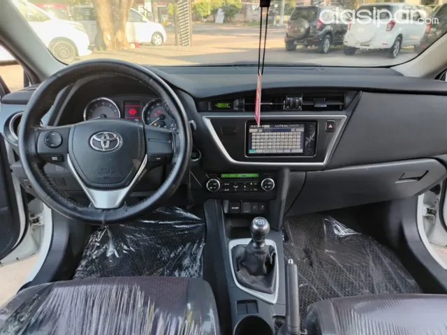 Toyota New Auris 2015 — foto 7