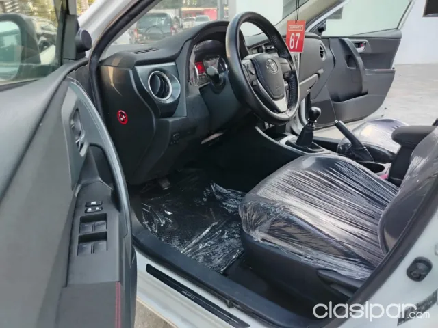 Toyota New Auris 2015 — foto 8