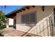 VENDO CASA CON LOCAL COMERCIAL EN SAN LORENZO