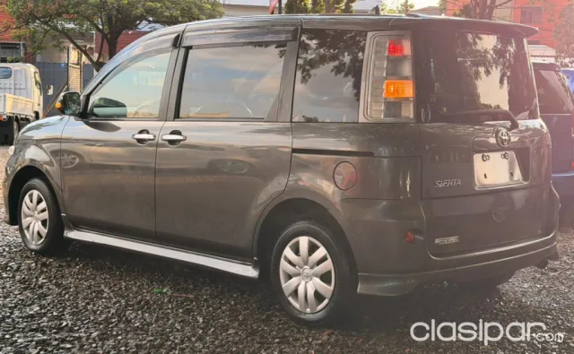 Toyota Sienta 2009 — foto 6