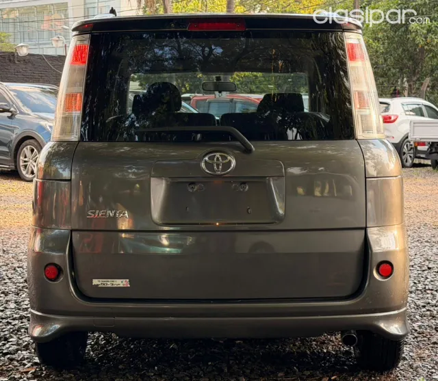 Toyota Sienta 2009 — foto 8