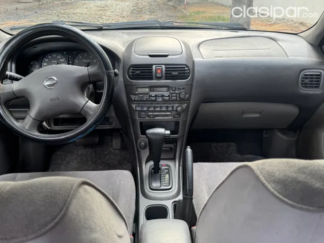 Nissan Sunny 2003 — foto 7