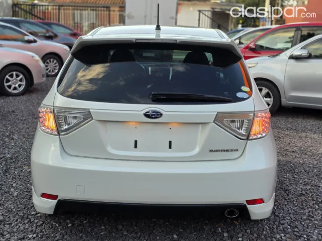 Subaru Impreza 2011 — foto 3