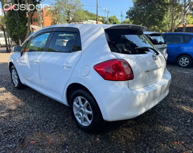 Toyota Auris 2008 — foto 8