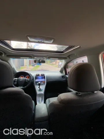 Toyota Auris 2011 — foto 6