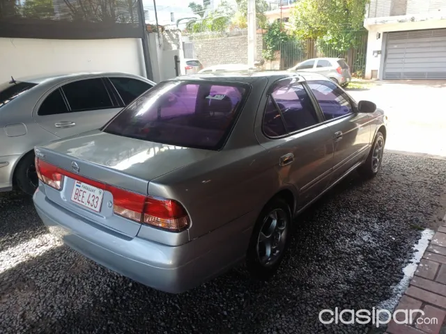 Nissan Sunny 2004 — foto 4