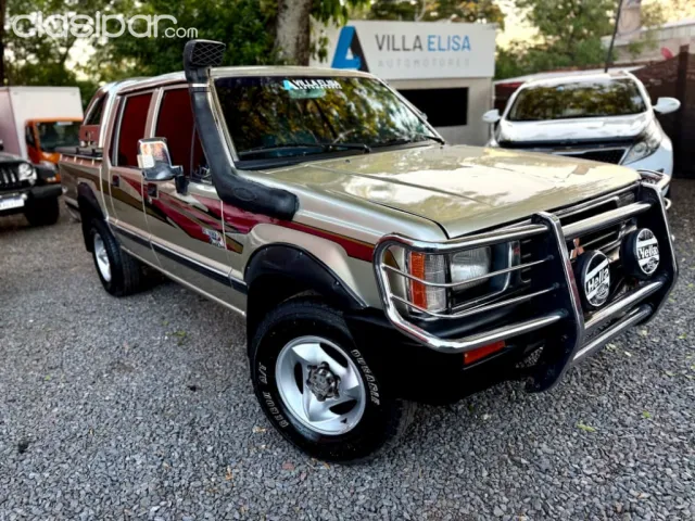Mitsubishi L 200 1992 — foto 7