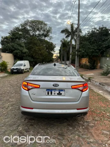 Kia K5 2011 — foto 6