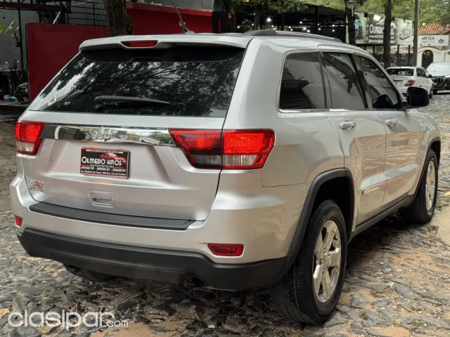 Jeep Grand Cherokee 2012 — foto 6
