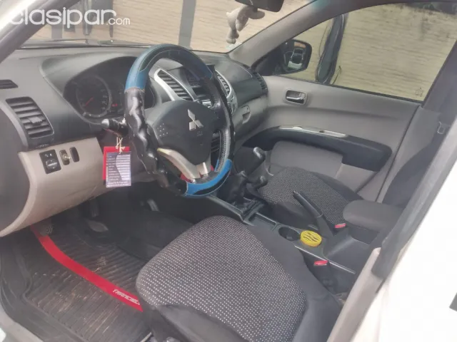 Mitsubishi L 200 2013 — foto 4