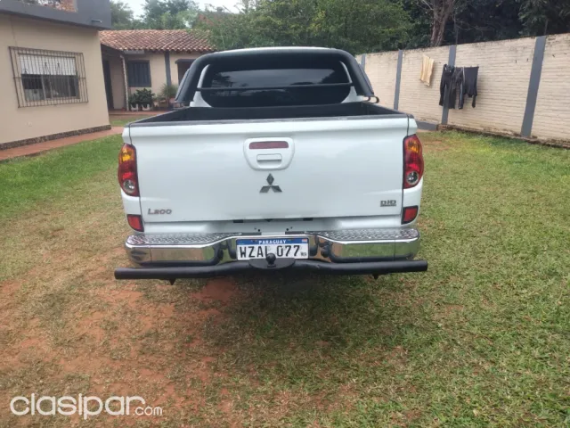 Mitsubishi L 200 2013 — foto 3