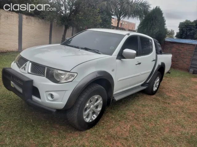 Mitsubishi L 200 2013 — foto 5