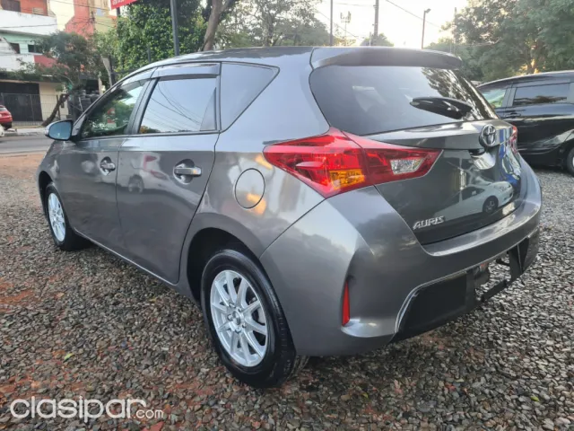 Toyota New Auris 2014 — foto 7