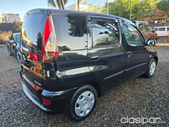 Toyota Funcargo 2004 — foto 6