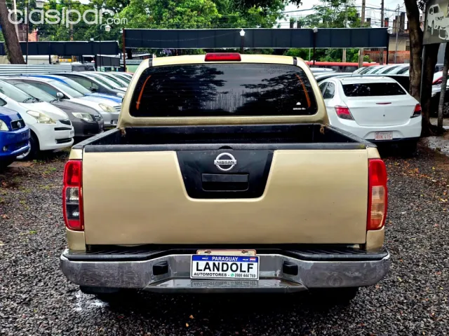 Nissan Navara 2009 — foto 4