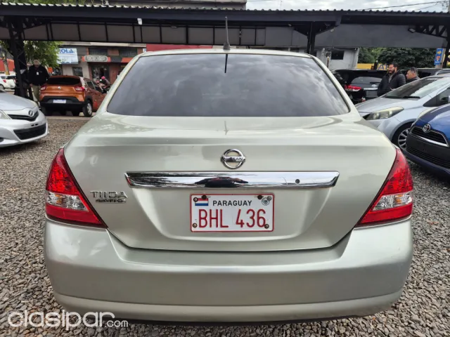 Nissan Tiida 2005 — foto 8