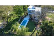 Vendo lujosa residencia en Lambaré – Zona Yacht | USD 770.000